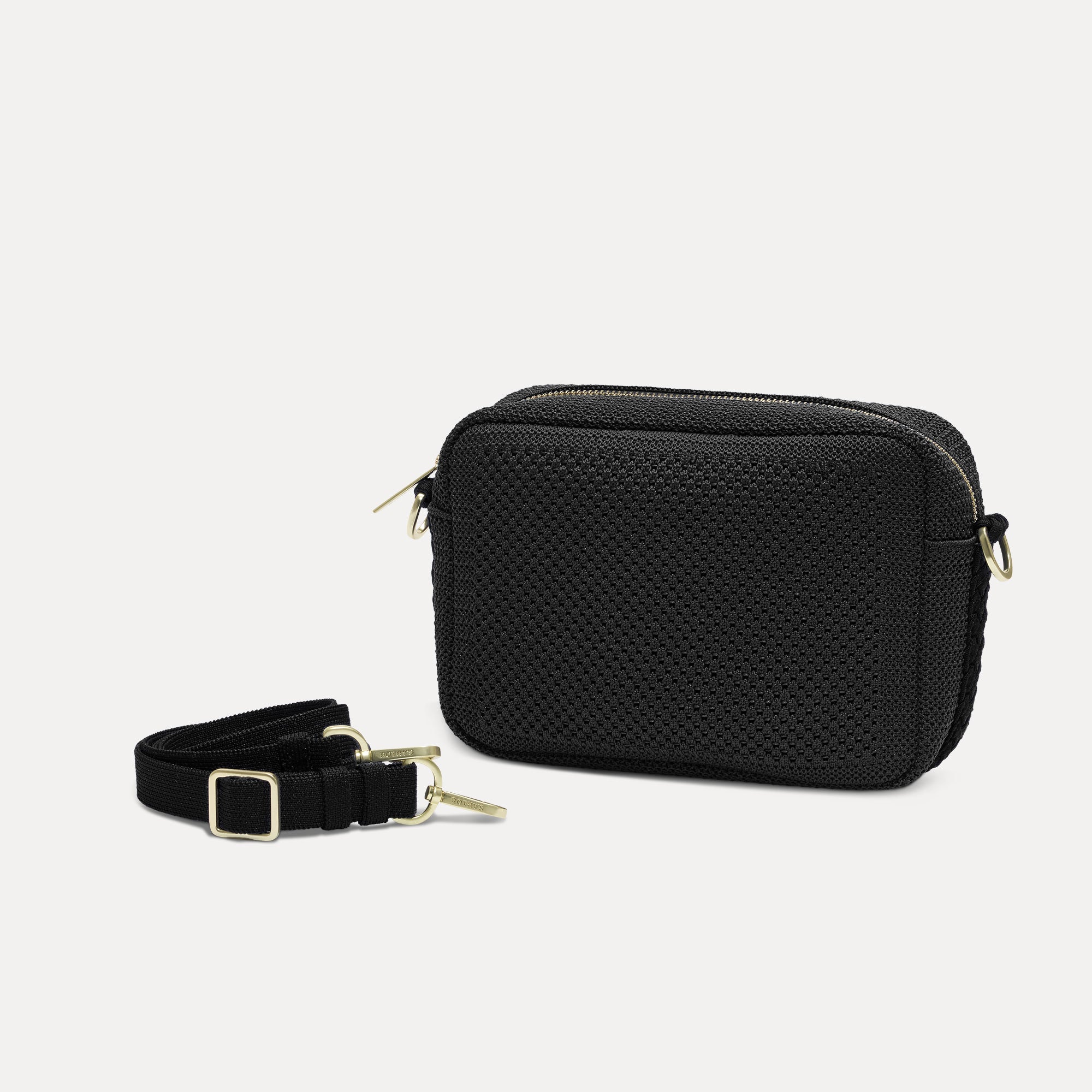 450_CrossbodyCameraBagBraided_LagoonOpen-Knit_Strap_4473_3fd7d5e9-87b4-48c9-a1c9-728ad2d2ce42.jpg